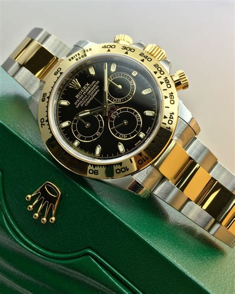 gold and black rolex daytona|rolex daytona watch price.